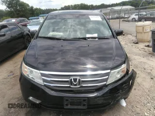 2012 Honda Odyssey Touring with VIN 5FNRL5H97CB066596, listed as a IAAI auction lot 42472935 with 217,182 mi miles and . Bid and sale history available at DreamBid. Image 12.
