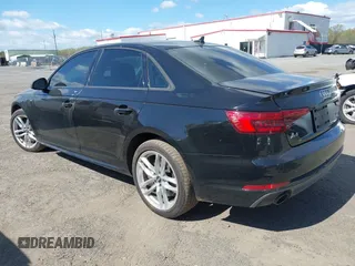 2017 Audi A4 Season of Audi Premium with VIN WAUDNAF47HN041627, listed as a IAAI auction lot 42052841 with 97,952 mi miles. Bid and sale history available at carsss.com. Image 3.