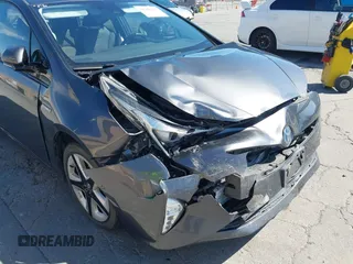 2016 Toyota Prius Four z VIN JTDKARFUXG3019426, wystawiony jako IAAI lot #42385785 z przebiegiem 94 838 mil mil oraz . Historia ofert i sprzedaży dostępna na DreamBid. Obrazek 6.