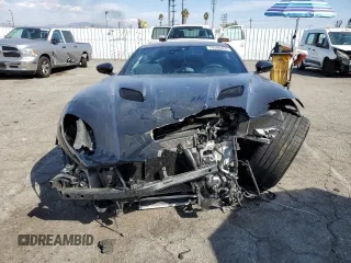 2020 Aston Martin DBS Superleggera z VIN SCFRMHAV7LGR02212, wystawiony jako Copart lot #74386264 z przebiegiem Nie podano mil oraz Szkody całkowita. Historia ofert i sprzedaży dostępna na DreamBid. Obrazek 5.