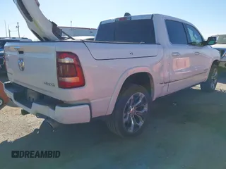 2020 Ram 1500 Limited with VIN 1C6SRFHT7LN258515, listed as a IAAI auction lot 41661635 with 125,699 mi miles and . Bid and sale history available at DreamBid. Image 4.