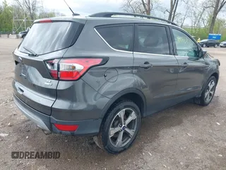 2017 Ford Escape SE with VIN 1FMCU9GD4HUE45193, listed as a IAAI auction lot 42055861 with 154,961 mi miles and . Bid and sale history available at DreamBid. Image 4.