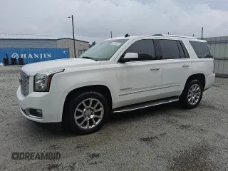 2015 GMC Yukon Denali z VIN 1GKS2CKJ4FR131614, wystawiony jako Copart lot #58658245 z przebiegiem 183 612 mil mil oraz Czysty tytuł • Clean title. Historia ofert i sprzedaży dostępna na DreamBid. Obrazek 1.