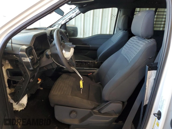 2023 Ford F-150 XL with VIN 1FTEW1CP2PKD69265, listed as a Copart auction lot 44341405 with 15,368 mi miles and Salvage Title. Bid and sale history available at DreamBid. Image 7.