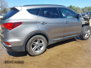 2018 Hyundai Santa Fe Sport 2.4L with VIN 5XYZU3LB5JG571084, listed as a IAAI auction lot 41764986 with 64,148 mi miles. Bid and sale history available at carsss.com. Image 4.