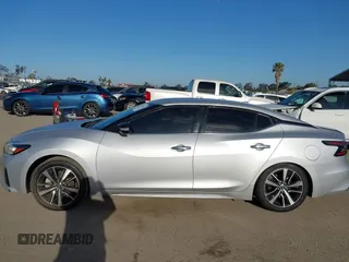 2021 Nissan Maxima SV with VIN 1N4AA6CV7MC512294, listed as a IAAI auction lot 42243607 with 87,803 mi miles and . Bid and sale history available at DreamBid. Image 14.