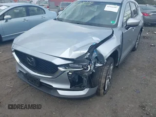 2021 Mazda CX-5 Grand Touring with VIN JM3KFBDM3M0354348, listed as a IAAI auction lot 41924207 with 45,786 mi miles. Bid and sale history available at carsss.com. Image 6.