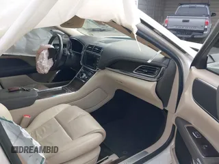 2017 Lincoln Continental Select with VIN 1LN6L9TK3H5605885, listed as a IAAI auction lot 41123925 with 142,077 mi miles. Bid and sale history available at carsss.com. Image 5.