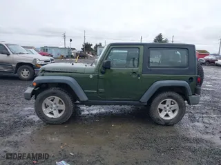 2008 Jeep Wrangler Rubicon with VIN 1J4GA64108L643373, listed as a IAAI auction lot 41489367 with 118,023 mi miles. Bid and sale history available at carsss.com. Image 14.