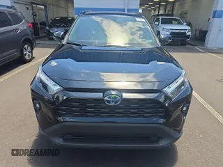 2022 Toyota RAV4 Hybrid XLE Premium z VIN 4T3B6RFVXNU071885, wystawiony jako IAAI lot #42730174 z przebiegiem 53 502 mil mil oraz . Historia ofert i sprzedaży dostępna na DreamBid. Obrazek 9.
