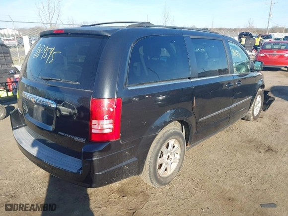 2009 Chrysler Town & Country Touring with VIN 2A8HR54159R593858, listed as a IAAI auction lot 41829595 with 187,974 mi miles. Bid and sale history available at carsss.com. Image 4.