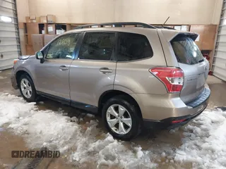 2014 Subaru Forester 2.5i Touring with VIN JF2SJAPC3EH541727, listed as a IAAI auction lot 41812809 with 94,506 mi miles. Bid and sale history available at carsss.com. Image 3.
