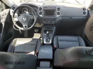 2014 Volkswagen Tiguan SEL с VIN WVGAV3AXXEW556593, выставлен на аукционе Copart как лот 57872585 с пробегом 113 312 миль миль и Чистый • Clean title. История ставок и продаж доступна на DreamBid. Изображение 8.
