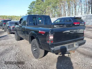 2011 Ford Ranger XLT with VIN 1FTLR4FE9BPB07796, listed as a IAAI auction lot 42128597 with 235,512 mi miles. Bid and sale history available at carsss.com. Image 3.