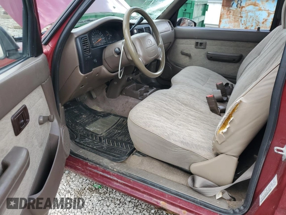 1999 Toyota Tacoma z VIN 4TANL42N4XZ435246, wystawiony jako Copart lot #56843025 z przebiegiem 197 295 mil mil oraz Szkoda całkowita • Salvage title. Historia ofert i sprzedaży dostępna na DreamBid. Obrazek 8.