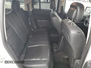 2014 Jeep Patriot Latitude z VIN 1C4NJPFA2ED928050, wystawiony jako Copart lot #50195295 z przebiegiem 130 437 mil mil oraz Szkoda całkowita • Salvage title. Historia ofert i sprzedaży dostępna na DreamBid. Obrazek 11.