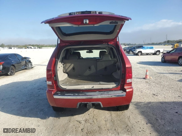 2010 Jeep Grand Cherokee Limited with VIN 1J4RR5GT3AC138054, listed as a Copart auction lot 43238655 with 142,145 mi miles and Salvage Title. Bid and sale history available at carsss.com. Image 6.