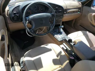 1996 BMW 3-Series 328IC with VIN WBABK8327TET92381, listed as a Copart auction lot 54410784 with 102,695 mi miles and Salvage Title. Bid and sale history available at carsss.com. Image 8.