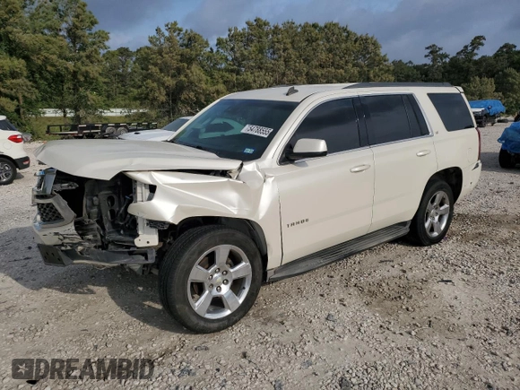 2015 Chevrolet Tahoe LT with VIN 1GNSCBKC9FR220574, listed as a Copart auction lot 54788555 with 244,491 mi miles and Salvage title. Bid and sale history available at DreamBid. Image 1.