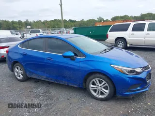 2016 Chevrolet Cruze LT z VIN 1G1BE5SM5G7321470, wystawiony jako IAAI lot #40456371 z przebiegiem 90 350 mil mil oraz . Historia ofert i sprzedaży dostępna na DreamBid. Obrazek 13.