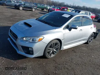 2016 Subaru WRX Premium with VIN JF1VA1E65G9810998, listed as a IAAI auction lot 41545599 with 123,135 mi miles. Bid and sale history available at carsss.com. Image 18.