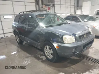 2004 Hyundai Santa Fe GLS z VIN KM8SC73E34U686433, wystawiony jako IAAI lot #41346238 z przebiegiem 164 450 mil mil oraz . Historia ofert i sprzedaży dostępna na DreamBid. Obrazek 1.