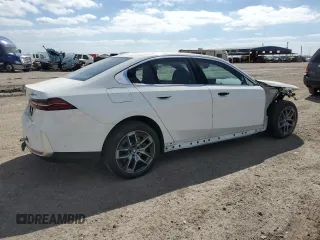 2024 BMW i5 eDrive40 with VIN WBY33FK05RCR50188, listed as a Copart auction lot 52953195 with 423 mi miles and Salvage title. Bid and sale history available at DreamBid. Image 3.