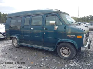 1995 Chevrolet Chevy Van z VIN 1GBEG25K0SF243254, wystawiony jako IAAI lot #41915622 z przebiegiem 74 262 mil mil oraz . Historia ofert i sprzedaży dostępna na DreamBid. Obrazek 13.