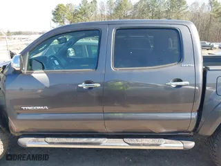 2013 Toyota Tacoma PreRunner with VIN 5TFJU4GN2DX031877, listed as a IAAI auction lot 41532757 with 176,797 mi miles. Bid and sale history available at carsss.com. Image 14.