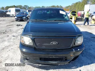 2002 Ford F-150 Harley Davidson with VIN 1FTRW07312KC24102, listed as a IAAI auction lot 41591917 with 1 mi miles. Bid and sale history available at carsss.com. Image 13.