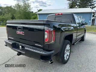 2018 GMC Sierra 1500 Denali z VIN 3GTU2PEJXJG171695, wystawiony jako Copart lot #59631005 z przebiegiem 226 029 mil mil oraz Czysty tytuł • Clean title. Historia ofert i sprzedaży dostępna na DreamBid. Obrazek 4.