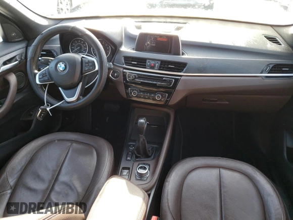 2017 BMW X1 xDrive28i with VIN WBXHT3C33H5F77000, listed as a Copart auction lot 41860993 with 113,553 mi miles. Bid and sale history available at carsss.com. Image 8.