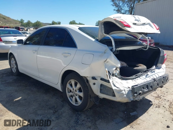 2009 Toyota Camry with VIN 4T1BE46K19U851560, listed as a IAAI auction lot 41812628 with 244,313 mi miles. Bid and sale history available at carsss.com. Image 3.