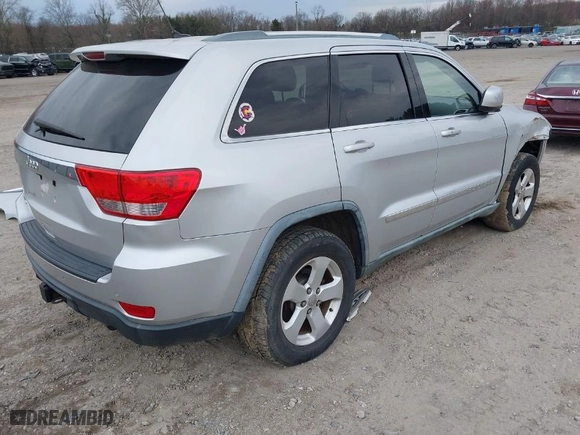 2011 Jeep Grand Cherokee Laredo with VIN 1J4RR4GG9BC718861, listed as a IAAI auction lot 41920517 with 144,245 mi miles. Bid and sale history available at carsss.com. Image 4.