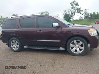 2014 Nissan Armada SL z VIN 5N1BA0NC8EN601509, wystawiony jako IAAI lot #42420782 z przebiegiem 131 717 mil mil oraz . Historia ofert i sprzedaży dostępna na DreamBid. Obrazek 13.
