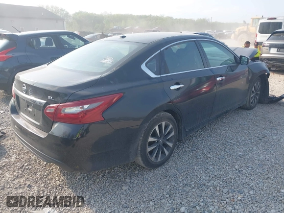 2018 Nissan Altima SR with VIN 1N4AL3AP9JC166595, listed as a IAAI auction lot 42138175 with 98,377 mi miles and . Bid and sale history available at carsss.com. Image 4.