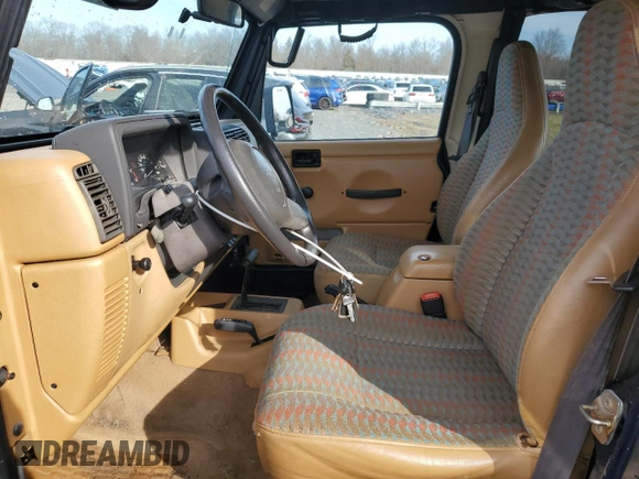 1997 Jeep Wrangler Sport with VIN 1J4FY19S2VP498840, listed as a Copart auction lot 50058885 with 151,697 mi miles and Salvage Title. Bid and sale history available at carsss.com. Image 7.