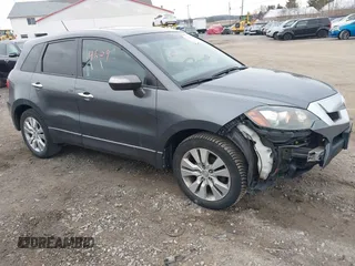2010 Acura RDX with VIN 5J8TB1H21AA008236, listed as a IAAI auction lot 41664609 with 136,394 mi miles. Bid and sale history available at carsss.com. Image 1.