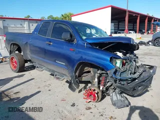 2015 Toyota Tundra SR with VIN 5TFRM5F1XFX088497, listed as a IAAI auction lot 42638868 with 117,195 mi miles and . Bid and sale history available at DreamBid. Image 1.