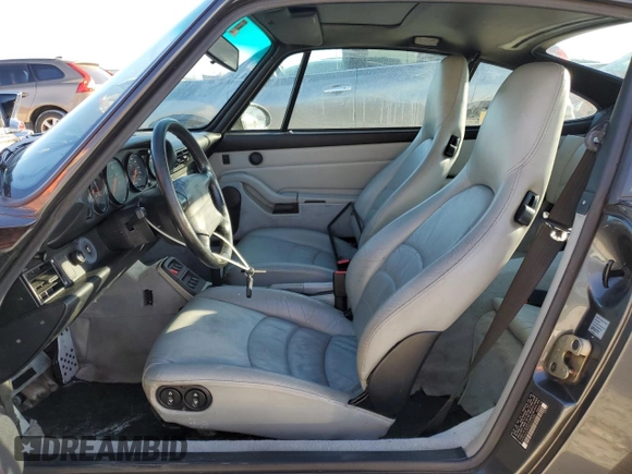 1995 Porsche 911 Carrera with VIN WP0AA2994SS323280, listed as a Copart auction lot 75304104 with 105,675 mi miles and Salvage Title. Bid and sale history available at carsss.com. Image 7.