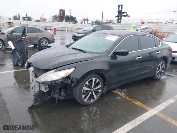 2018 Nissan Altima 2.5 SV with VIN 1N4AL3AP9JC117719, listed as a IAAI auction lot 41720521 with 103,541 mi miles. Bid and sale history available at carsss.com. Image 2.