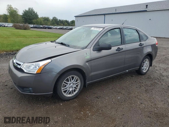2009 Ford Focus SE with VIN 1FAHP35N39W258484, listed as a Copart auction lot 72679704 with 88,824 mi miles and Salvage Title. Bid and sale history available at DreamBid. Image 1.