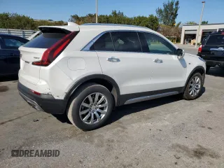 2022 Cadillac XT4 FWD Premium Luxury with VIN 1GYFZCR45NF100049, listed as a Copart auction lot 50213255 with 62,391 mi miles and Salvage title. Bid and sale history available at DreamBid. Image 3.
