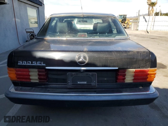 1991 Mercedes-Benz 560 with VIN WDBCA39E4MA583150, listed as a Copart auction lot 84738904 with 183,695 mi miles and Clean Title. Bid and sale history available at DreamBid. Image 6.
