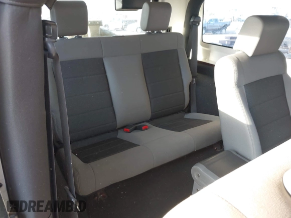 2008 Jeep Wrangler X with VIN 1J4FA24198L652934, listed as a IAAI auction lot 42573693 with 99,218 mi miles and . Bid and sale history available at DreamBid. Image 8.