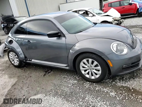 2014 Volkswagen Beetle Entry z VIN 3VWF17AT2EM642942, wystawiony jako Copart lot #60241445 z przebiegiem 70 780 mil mil oraz Szkoda całkowita • Salvage title. Historia ofert i sprzedaży dostępna na DreamBid. Obrazek 14.