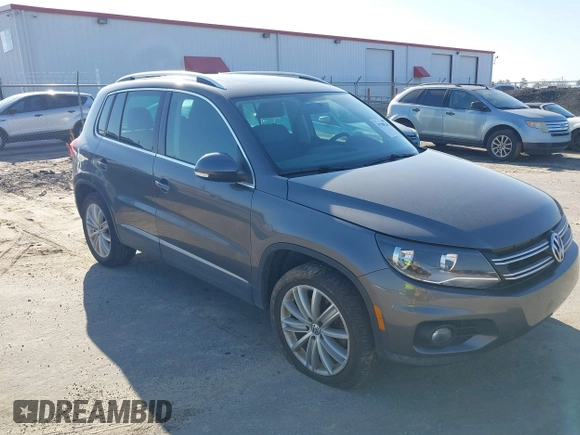 2012 Volkswagen Tiguan SE with VIN WVGAV7AX5CW000275, listed as a IAAI auction lot 41789246 with 123,618 mi miles and . Bid and sale history available at DreamBid. Image 1.