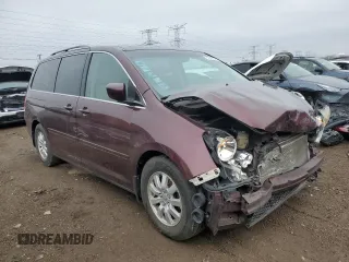 2010 Honda Odyssey EX-L with VIN 5FNRL3H62AB007415, listed as a Copart auction lot 52200245 with 184,601 mi miles and Salvage Title. Bid and sale history available at DreamBid. Image 4.