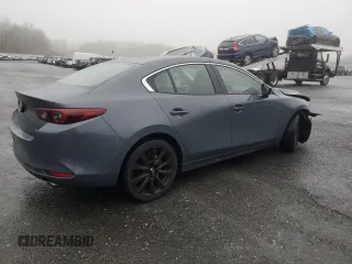 2023 Mazda 3 S Carbon Edition z VIN 3MZBPACM2PM377006, wystawiony jako Copart lot #85168304 z przebiegiem 20 920 mil mil oraz Szkoda całkowita • Salvage title. Historia ofert i sprzedaży dostępna na DreamBid. Obrazek 3.
