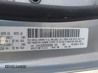 2013 Jeep Compass Latitude with VIN 1C4NJDEB2DD263920, listed as a IAAI auction lot 41832542 with 128,018 mi miles. Bid and sale history available at carsss.com. Image 9.